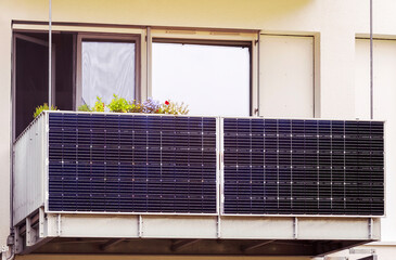 Solar Panel on Modern Balcony Apartment Buildingin Green City. Green Energy. Balcony Power Plant.