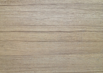 Light brown wood grain background.