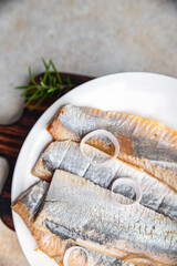 fish herring salted tasty seafood eating cooking meal food snack Pescetarian diet on the table copy...