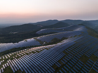 aerial view of solar power plant on hill