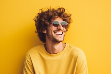 Handsome happy young man in glasses studio portrait, bright color background. AI generated
