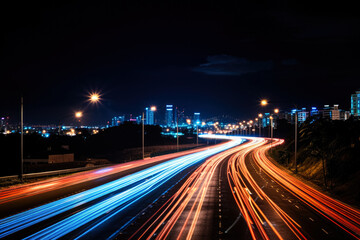 Fototapeta na wymiar A night scene of a highway captured with long exposure 