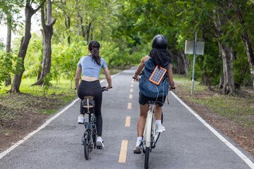 Biker fuse eco-awareness, cycling for fitness, solar for device power, and recycling into lifestyle