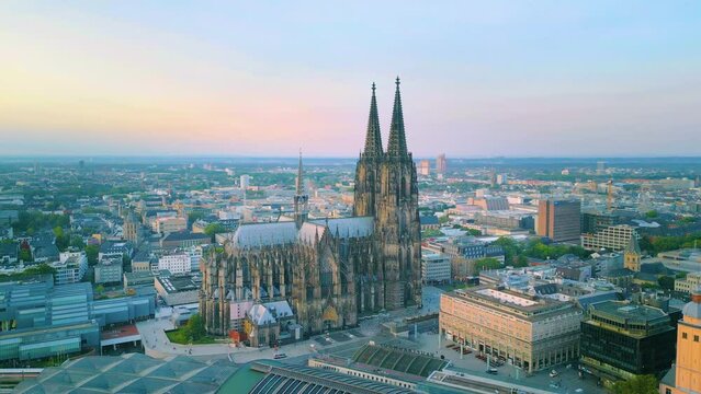 Cathedral Cologne Germany skyline aerial view fly over old town in city centr cologne skyline drone footage.