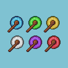 Pixel art sets of wizard staff with variation color item asset. Simple bits of magic wand weapon on pixelated style. 8bits perfect for game asset or design asset element for your game design asset.