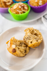 Lemon poppy seed muffins garnished with almond slivers