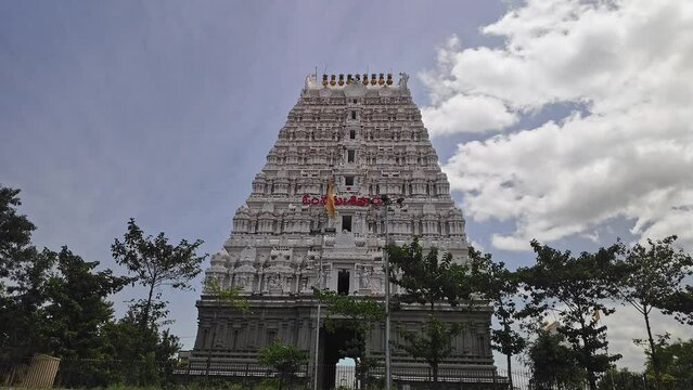 Huge Gopuram or temple entrance tower with detailed artwork and architecture