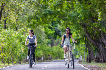 Fototapeta premium Biker fuse eco-awareness, cycling for fitness, solar for device power, and recycling into lifestyle