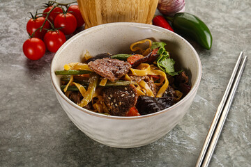 Asian wok with noodle, vegetables and beef