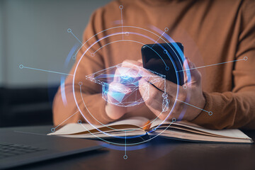 Man holding using smartphone typing at office workplace with notebook. Concept of distant work, business education. Educational hologram. Shot of hands