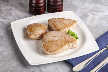 Roasted red tuna steak in the plate