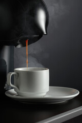 Espresso machine making fresh coffee.