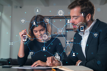 Businesspeople in formal wear taking notes signing contract at office workplace. Concept of important working moments, document sign, working process, concentration. Network hologram