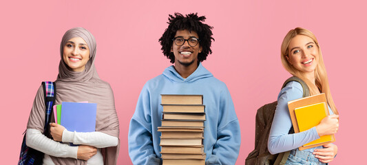 Education Concept. Portraits of diverse multiethnic students posing isolated on pink background