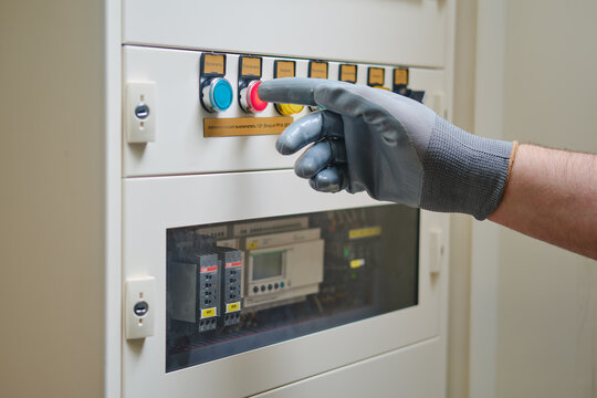 Abb ? Schneider industrial display shows the voltage of the electrical circuit. The electrician installed a new distribution system with an automatic switch - Moscow, Russia, September 17, 2022