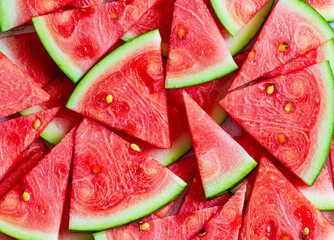 watermelon,A pile of freshly sliced watermelon as a texture background.