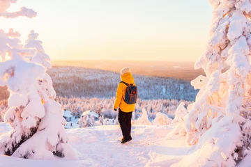 Foto op Aluminium Young woman in winter forest in Finland © BlueOrange Studio