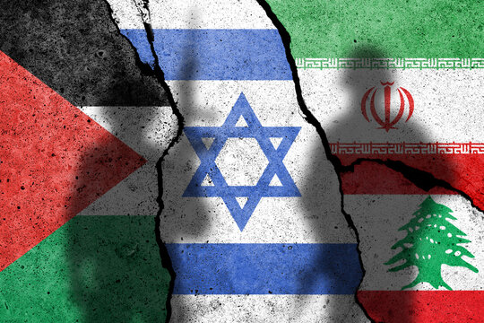 Flag of Palestine, Israel, Iran and Lebanon painted on the concrete wall with soldiers. Gaza and Israel conflict. Terrorist organizations hezbollah and hamas