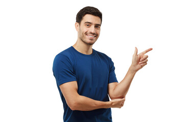 Handsome young man in blue t-shirt pointing right with his finger, showing direction
