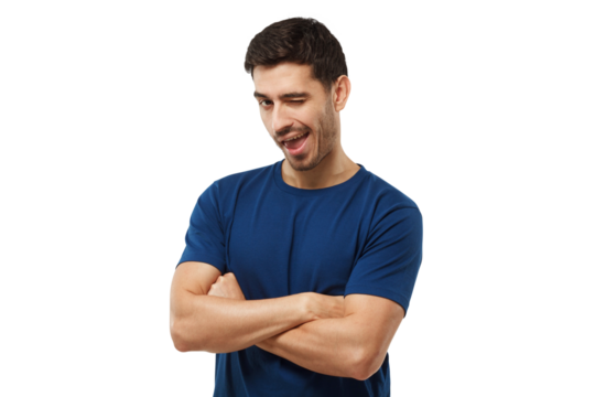 Handsome man with crossed arms smiling and winking at camera