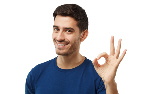 Young man showing OK or okay gesture with fingers of one hand