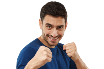 Confident man in casual blue t-shirt holding fists in front of him, ready to fight and defend himself
