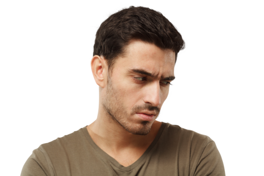 Portrait of offended young man, looking down, feeling guilty of relationship problems, stressed