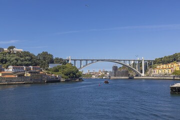 Naklejka premium Image of the bridge Ponte da Arrabida over the Douro river near Porto
