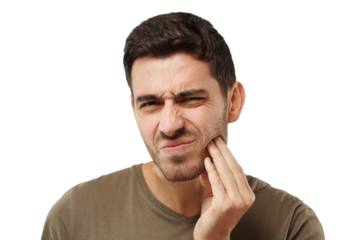 Young man feeling pain, holding his cheek with hand, suffering from bad toothache, looking at camera with painful expression