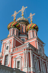 Fototapeta na wymiar Nizhny Novgorod, Russia, July 6, 2023. Colored domes and facades of the Nativity Church.