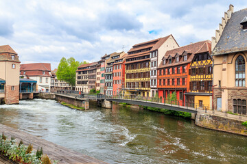 Fototapeta na wymiar Traditional half-timbered houses on the canals district Petite France in Strasbourg, Alsace, France. UNESCO World Heritage Site