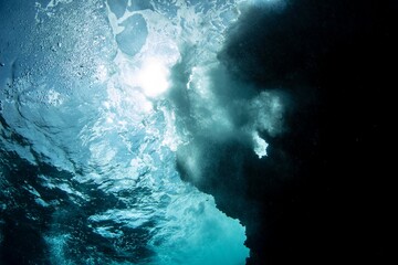 Looking at the sun underwater. Diving in the tunel of doom in Curaçao. Amazing dive site with lots...
