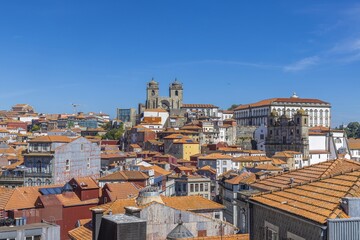 Picture taken over the roofs of the city of Porto with cathedral during the day