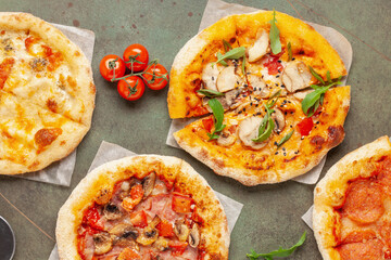 Fresh homemade Italian pizza of various kinds. Top view