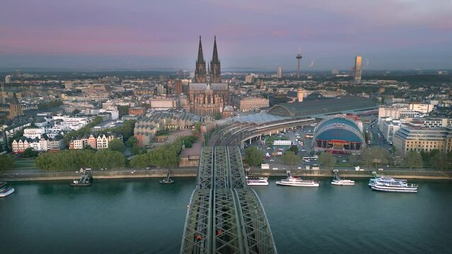 Cologne aerial skyline view fly over cologne bridge in front cologne cathedral dome in city cente, germany cologne.