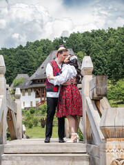 Wedding in Maramures, Romania. Bride and groom in traditional wedding clothes