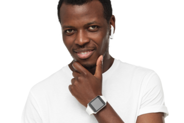 Young african american man looking at camera, showing smartwatch with blank screen, wearing wireless earphones and blank white t-shirt