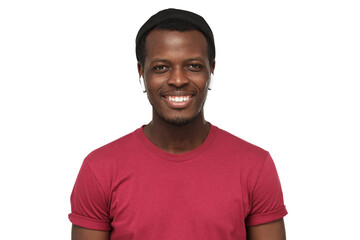 Smiling young handsome african american man wearing red t-shirt and wireless earphones