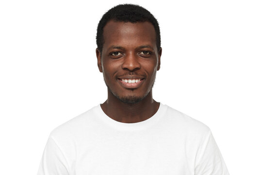Close-up portrait of smiling handsome african american man in blank white t-shirt