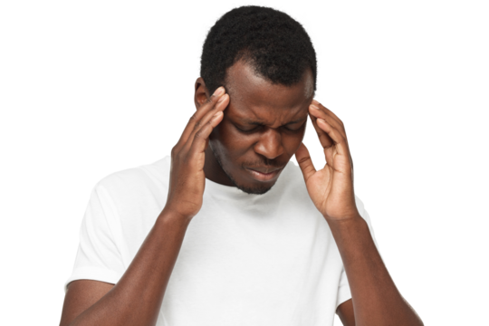 Young african american man suffering from headache, touching head with hands, migraine concept