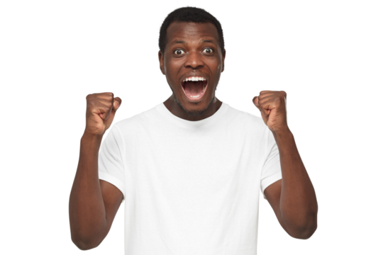 Shouting african american man celebrating win of his team, clenching fists in joyful euphoria as if feeling happy about victory