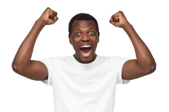 Screaming african american man, fan celebrating win of his team, clenching fists in joyful euphoria as if feeling happy about victory
