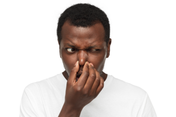 Bad smell. African american man holding his nose as if smelling something rotten and stinky looking away, trying to find source of odor
