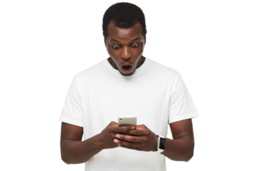 Portrait of african young man holding phone, looking scared and confused reading text message