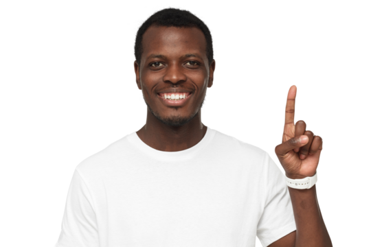 Happy young african man in white t-shirt pointing up with his finger