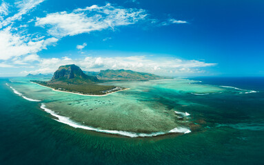 Aerial view: Le Morne Brabant mountain with beautiful lagoon and underwater waterfall illusion, Mauritius island