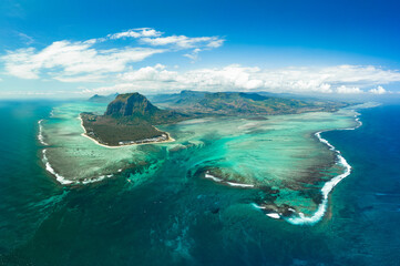 Aerial view: Le Morne Brabant mountain with beautiful lagoon and underwater waterfall illusion, Mauritius island