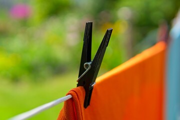 hanging laundry in the garden on a string              