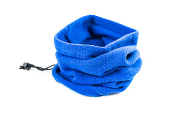 Blue fleece neck gaiter bunched up on a white background