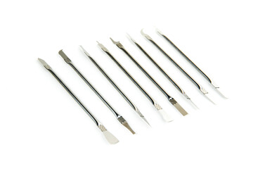 Silver computer repair tool kit with mutliple tips for lifting components